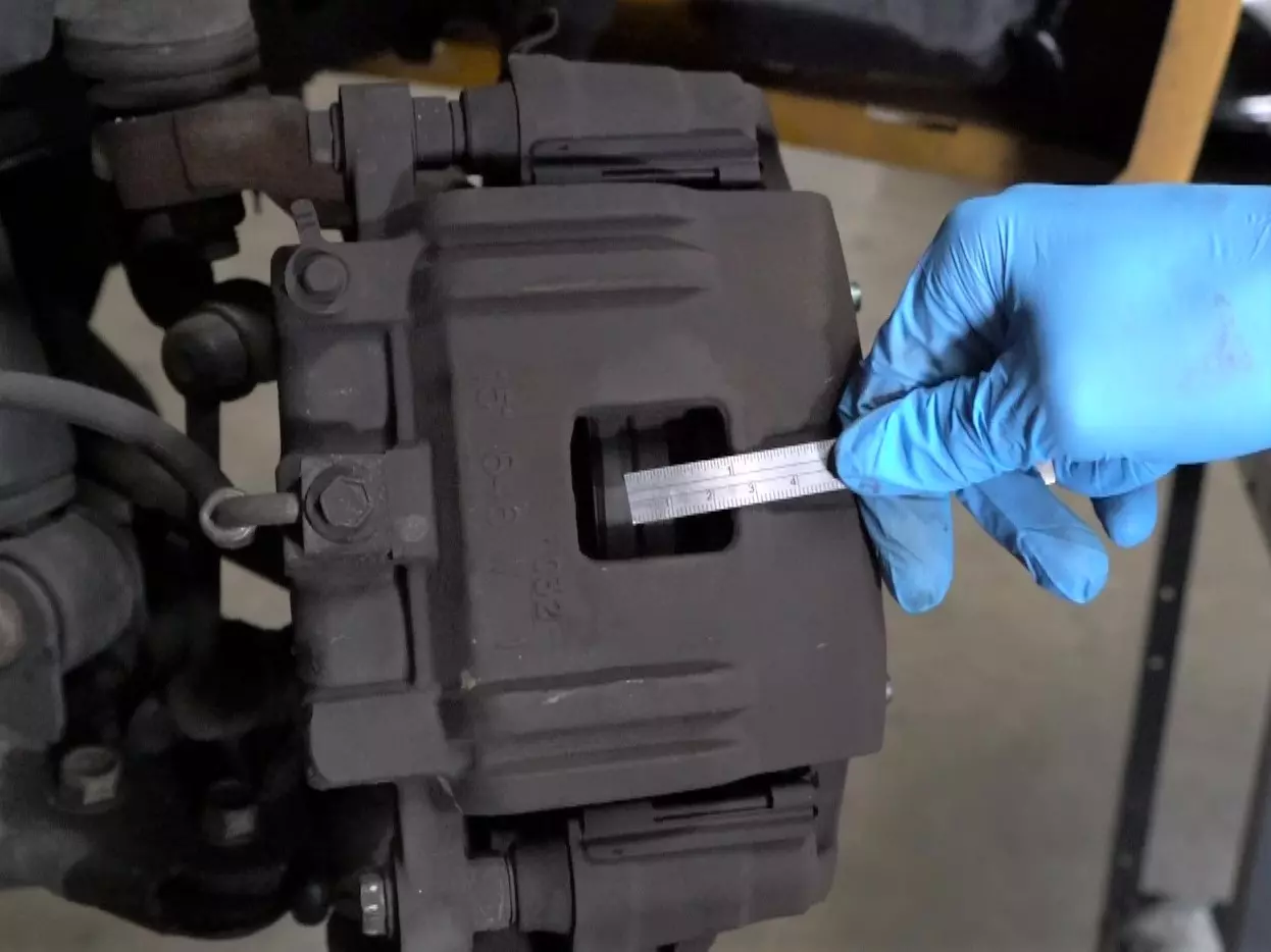 how-to-check-the-thickness-of-brake-pads-haynes-shows-you-how-haynes